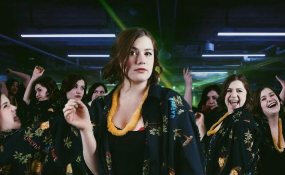 A photoshopped imaeg of many Abbey's seemingly in a club.